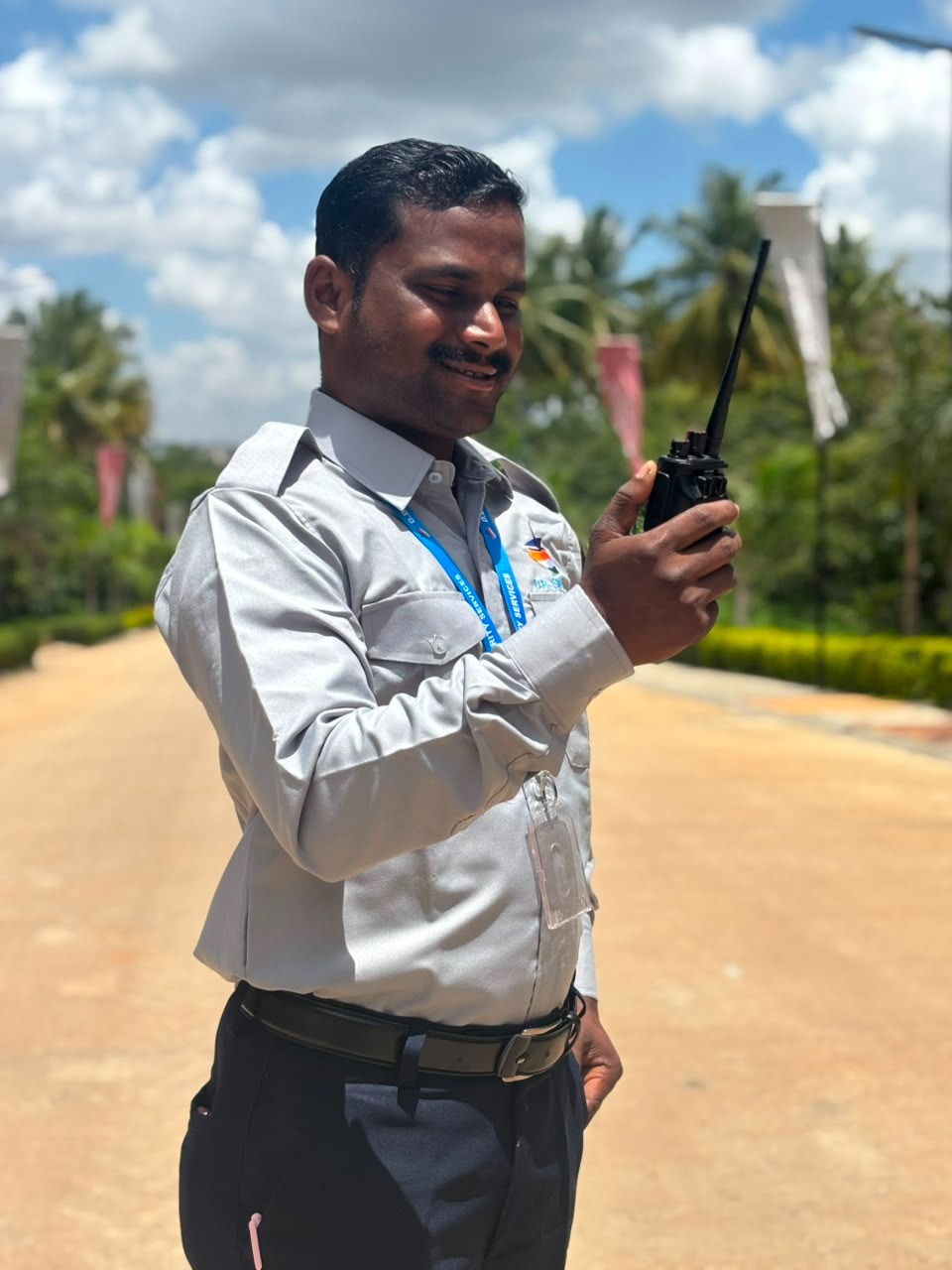 DB Security Services guard using a radio